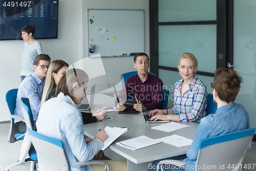 Image of Business Team At A Meeting at modern office building