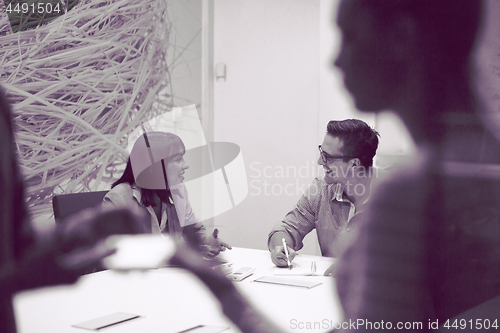 Image of Business Team At A Meeting at modern office building
