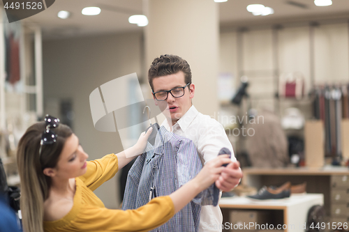 Image of couple in  Clothing Store