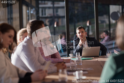 Image of Business Team At A Meeting at modern office building