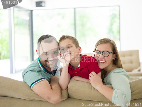 Image of family with little boy enjoys in the modern living room