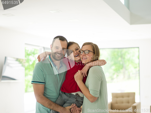 Image of family with little boy enjoys in the modern living room