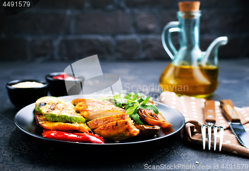 Image of chicken meat with grilled vegetables