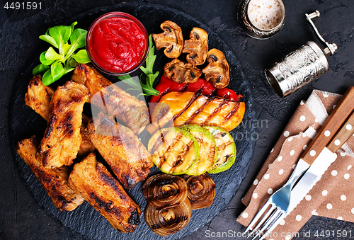 Image of grilled vegetables and ribs