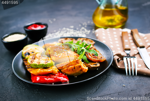 Image of chicken meat with grilled vegetables