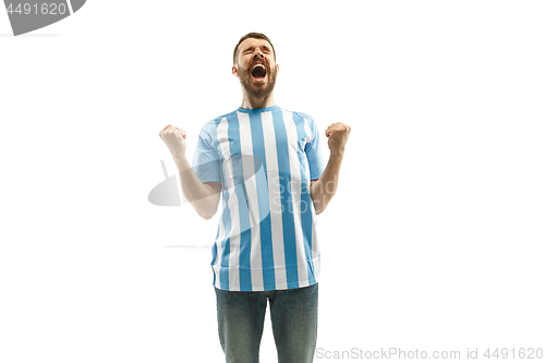 Image of The Argentinean soccer fan celebrating on white background