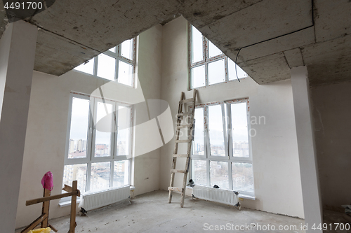 Image of The interior of the first floor in a two-story apartment in a new building