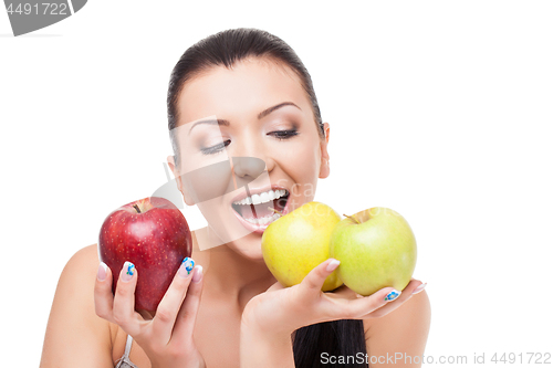 Image of Beautiful girl with apples