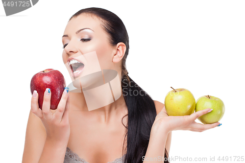 Image of Beautiful girl with apples