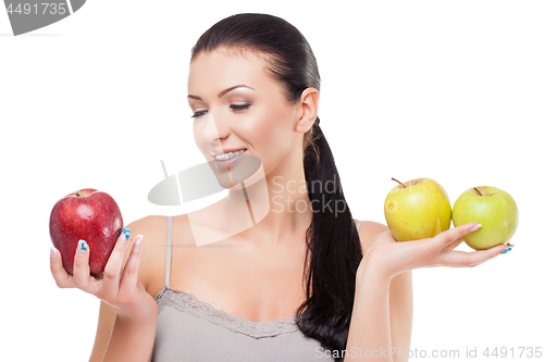 Image of Beautiful girl with apples