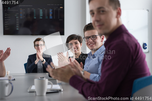 Image of Group of young people meeting in startup office