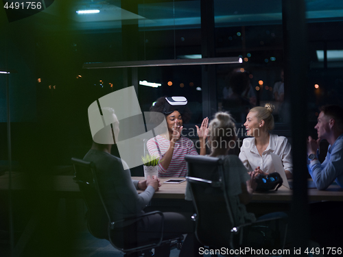 Image of Multiethnic Business team using virtual reality headset