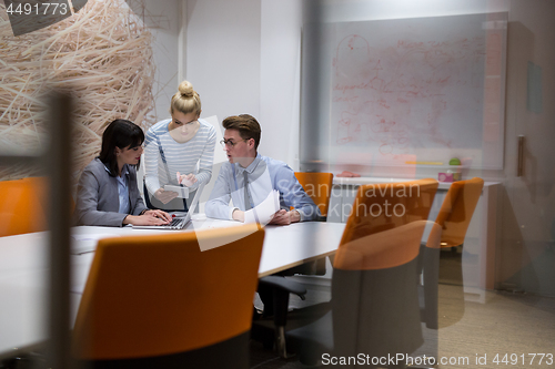Image of Business Team At A Meeting at modern office building