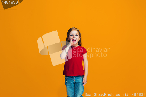 Image of Isolated on pink young casual teen girl shouting at studio