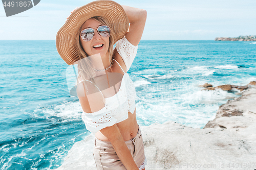 Image of Happy suntanned woman by ocean summer holiday recreation