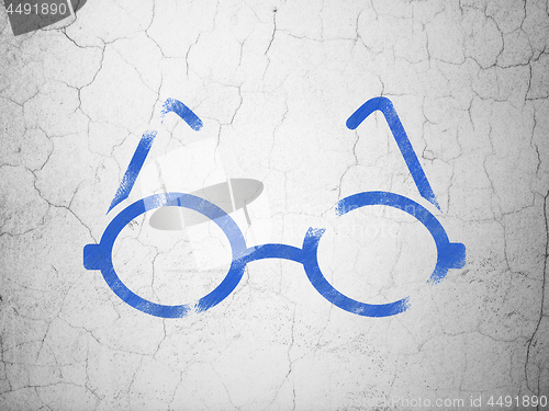 Image of Science concept: Glasses on wall background