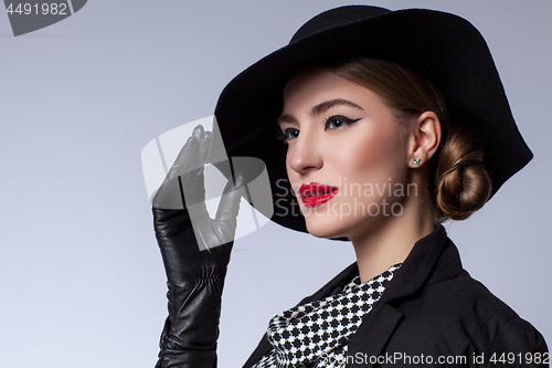 Image of Beautiful woman in retro dress