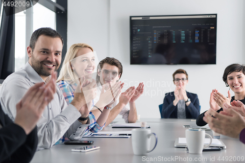 Image of Group of young people meeting in startup office