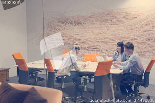 Image of Business Team At A Meeting at modern office building