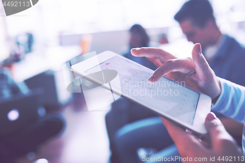 Image of Businesswoman using tablet