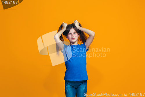 Image of The squint eyed teen girl with weird expression