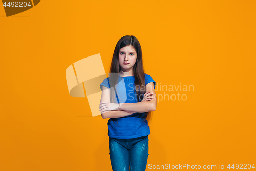 Image of Young serious thoughtful teen girl. Doubt concept.