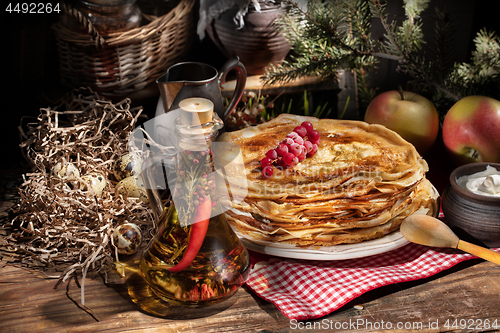 Image of Pancakes On An Old Wooden desk