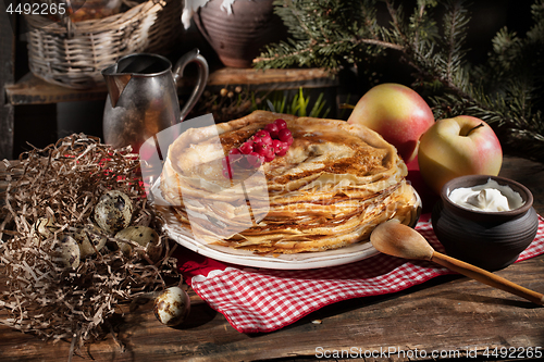 Image of Pancakes On An Old Wooden desk