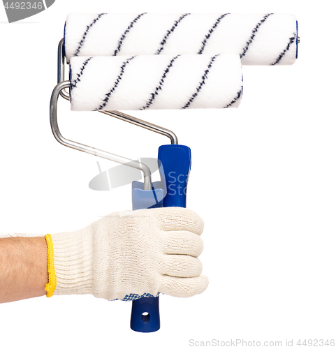 Image of Hand with glove and paint roller