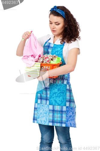 Image of Young housewife on white