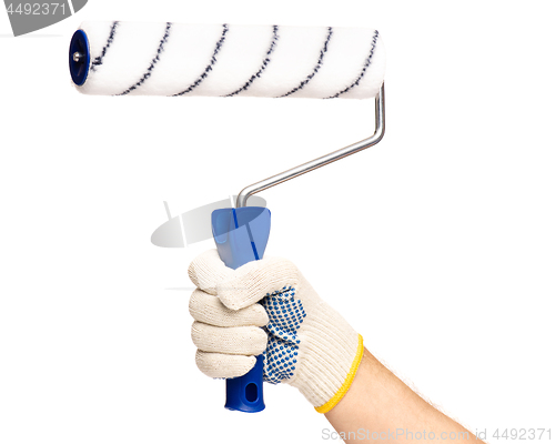 Image of Hand with glove and paint roller