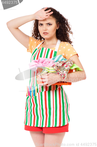 Image of Young housewife on white