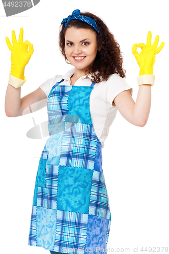 Image of Young housewife on white