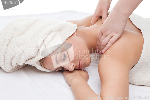 Image of Beautiful girl getting back massage