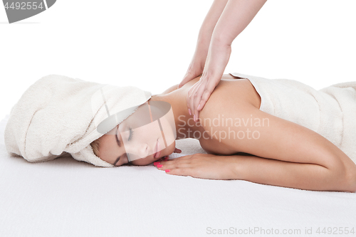 Image of Beautiful girl getting back massage