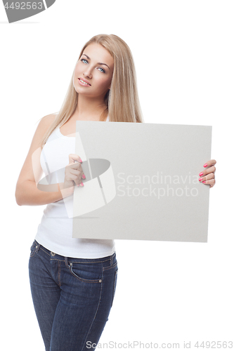 Image of Beautiful blond girl holding blank poster