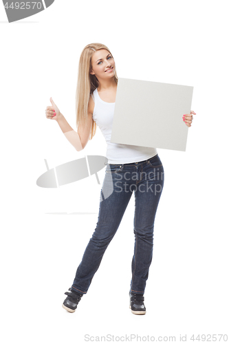 Image of Beautiful blond girl holding blank poster