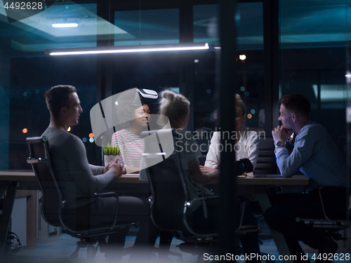 Image of Multiethnic Business team using virtual reality headset