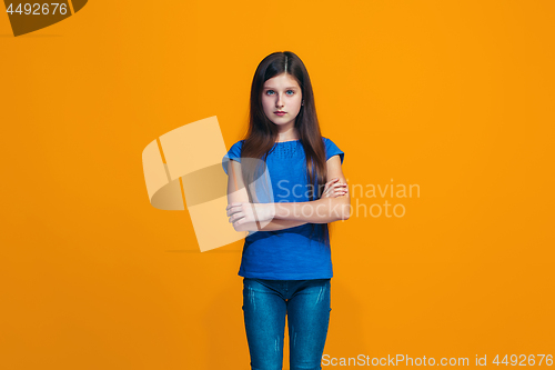 Image of Young serious thoughtful teen girl. Doubt concept.