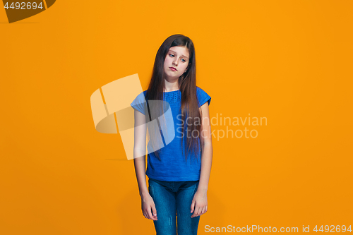 Image of Young serious thoughtful teen girl. Doubt concept.