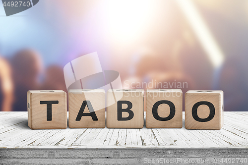 Image of Taboo sign on a table in a night club