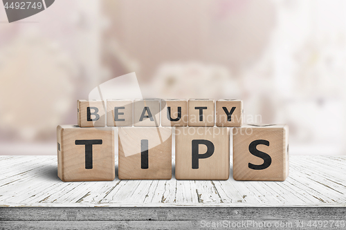 Image of Beauty tips sign on a makeup table