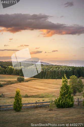 Image of Rural countryside landscape in the sunset