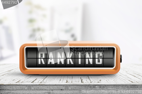 Image of Ranking sign on a wooden table with planks