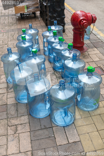 Image of Empty Water Bottles at Street