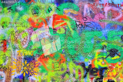 Image of Detail of the famous John Lennon's wall with graffiti in Prague