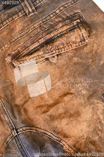 Image of Trousers with mud