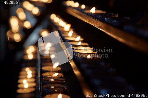 Image of Candles in a dark church
