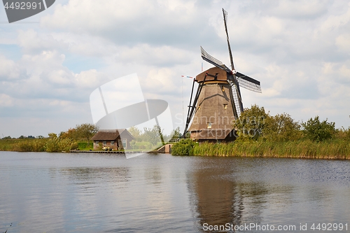 Image of Windmill beside a canal