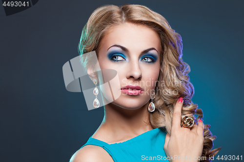Image of Beautiful girl in blue dress